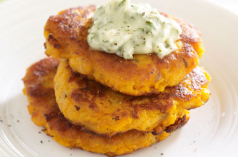 Sweet potato cakes with cheese and coriander dip