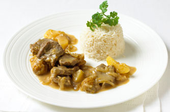 Lamb stew with apple and sour plums