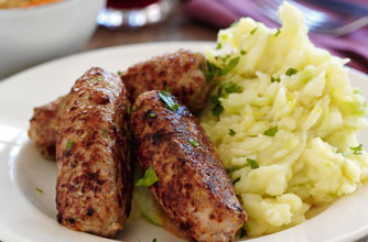Homemade mustard sausages and colcannon
