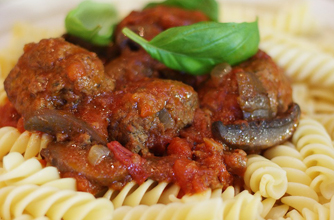 Beef meatballs in tomato and mushroom sauce
