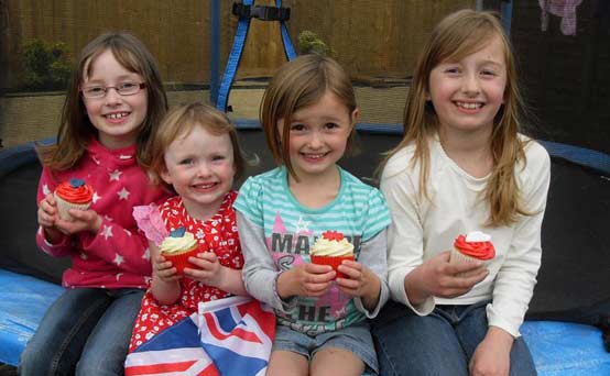 Girls enjoying their Royal Wedding cupcakes