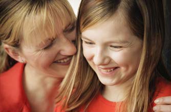 Mother and daughter laughing