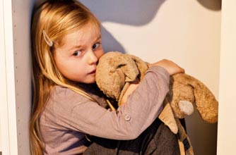 Little girl holding a soft toy
