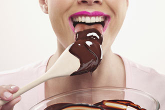 woman eating chocolate