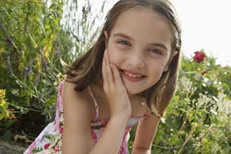 Happy girl in a garden Happy girl in a garden
