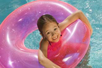 Child swimmign with rubber ring Child swimmign with rubber ring