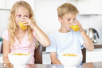 Kids eating breakfast Kids eating breakfast