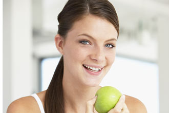Lady eating apple