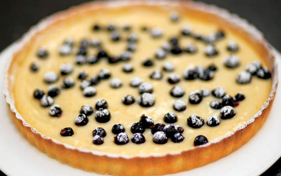Tana Ramsay's lemon tart with blackcurrants