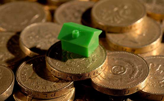 Monopoly house on coins