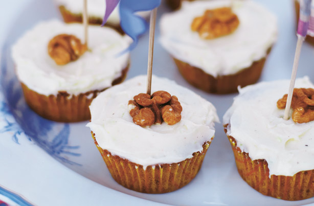 Carrot ginger and walnut cupcake with fluffly white icing