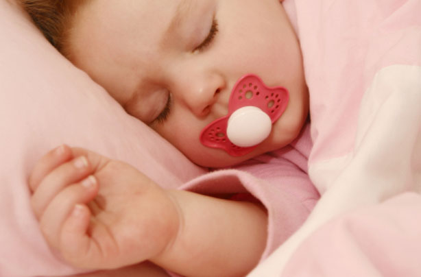 Baby asleep with dummy Baby asleep with dummy