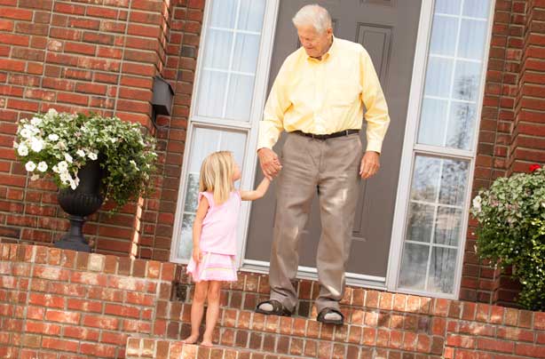 Girl hold hands with grandad Girl hold hands with grandad