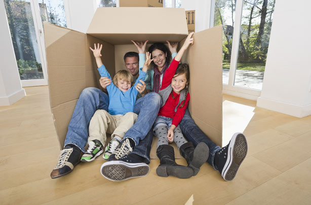 Family playing in a box