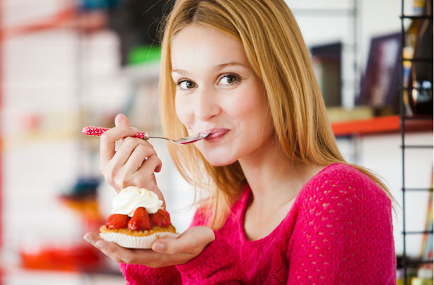 Woman eating cake Woman eating cake