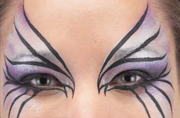 Spider mask face paint step 3: for the spider's web outline Spider mask face paint step 3: for the spider's web outline