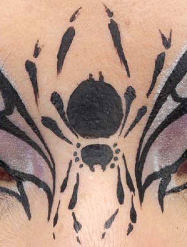 Spider mask face paint step 5: for the spider Spider mask face paint step 5: for the spider