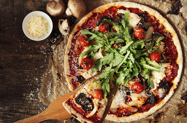 Chicken, mushroom and tomato pizza