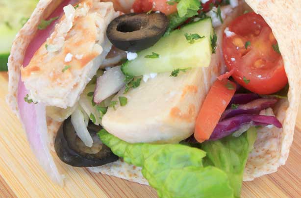 Greek salad and chicken wrap