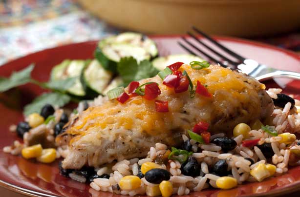 Cheesy topped chicken with Mexican rice