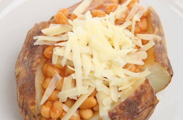 Crispy jacket potato with cheesy topped beans Crispy jacket potato with cheesy topped beans