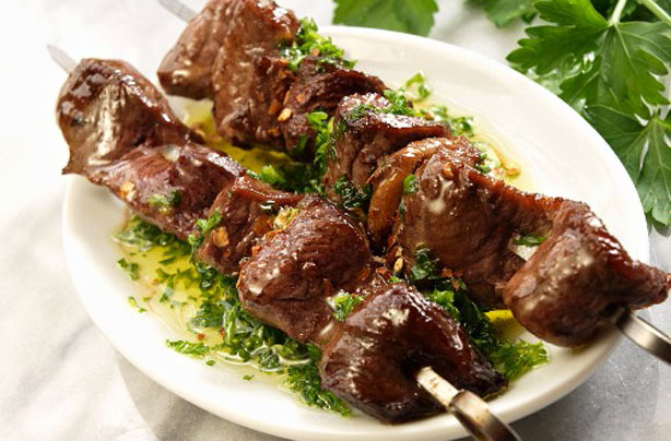 Skewered beef with chimichurri sauce