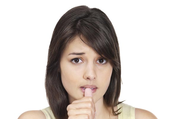 Woman nail biting