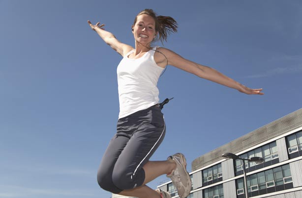 Woman jumping in the air