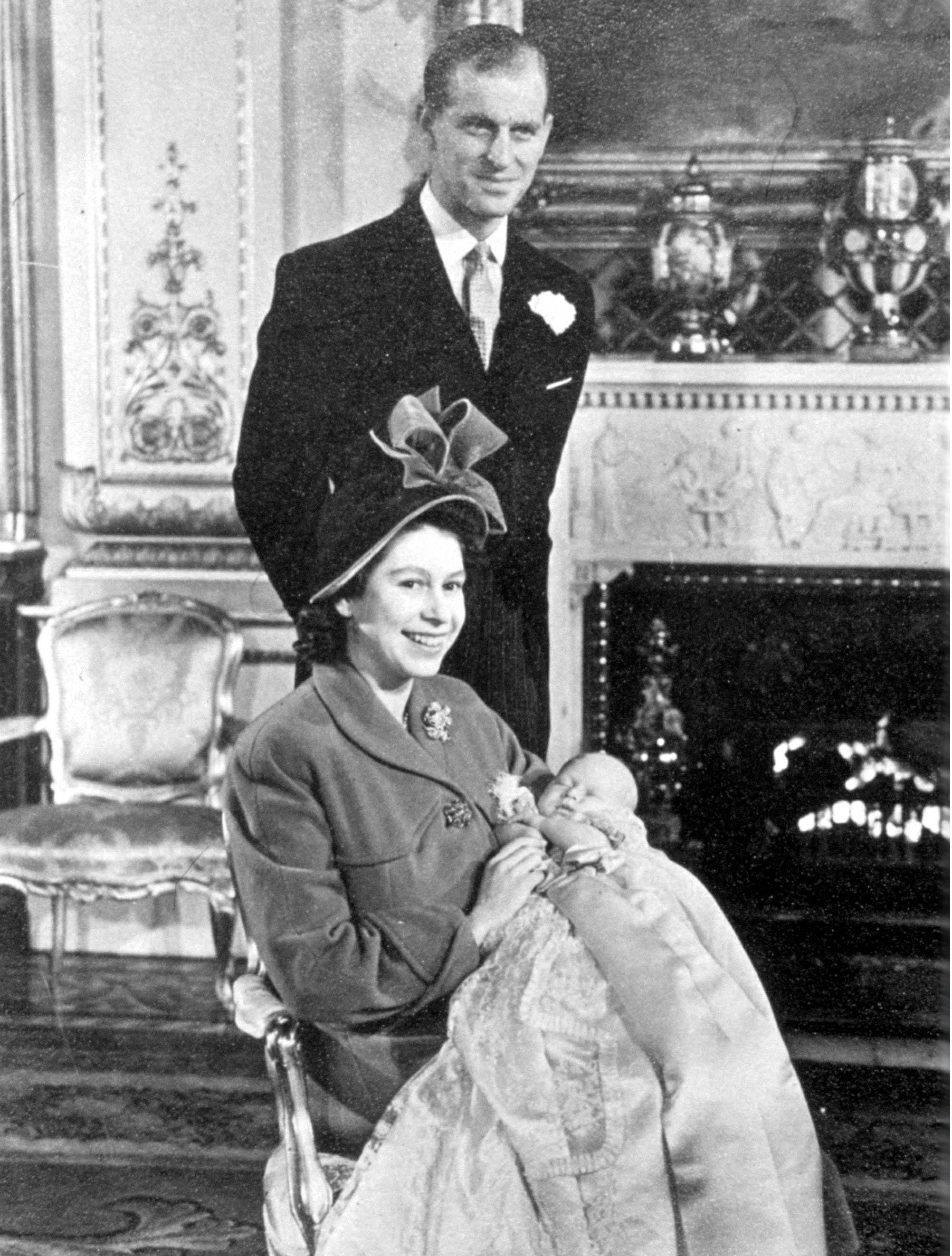 The Queen, Prince Phillip and Prince Charles as a baby The Queen, Prince Phillip and Prince Charles as a baby