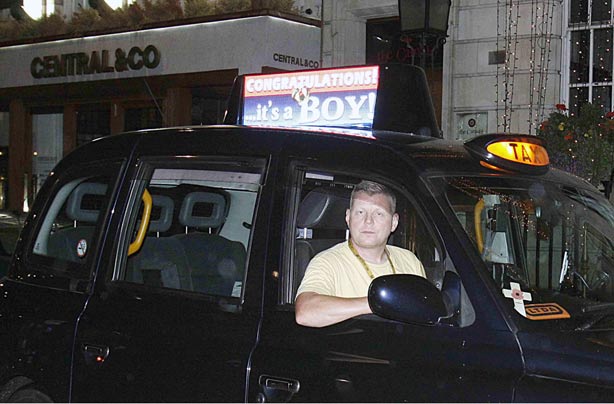 London black cab announcing the birth of the royal baby boy London black cab announcing the birth of the royal baby boy
