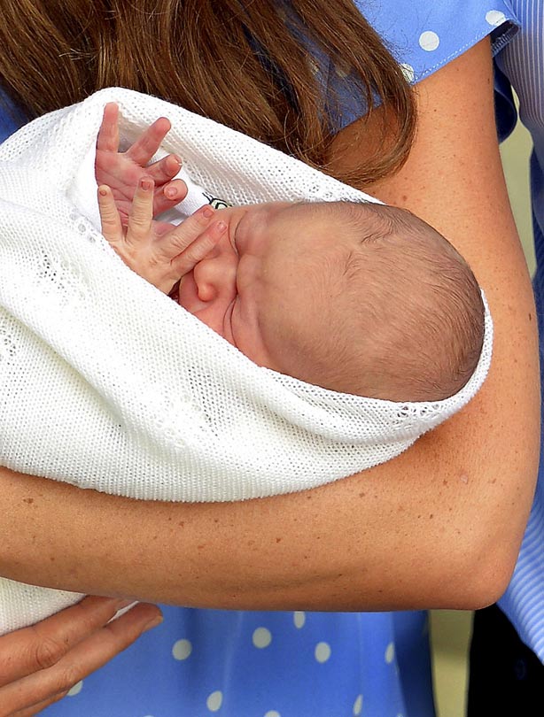 Kate Middleton holding her new baby son Kate Middleton holding her new baby son