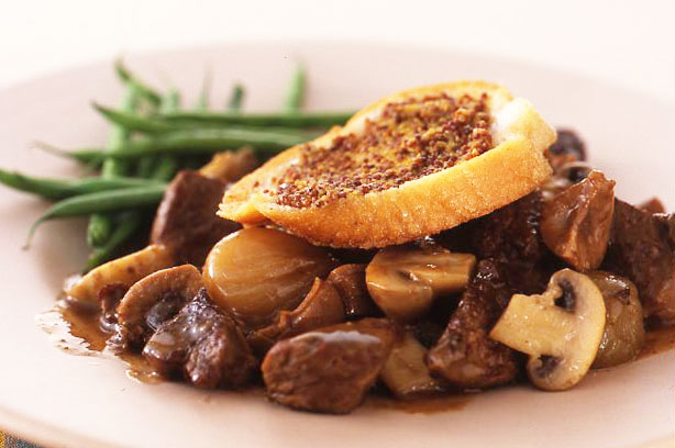 Steak and kidney casserole with mustard toasts