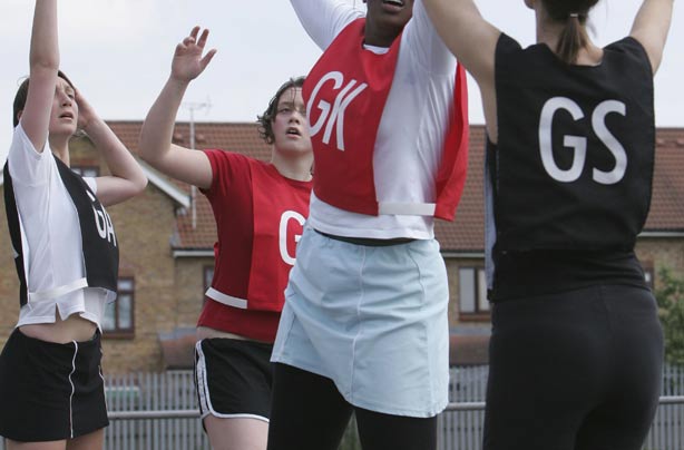 Women playing netball Women playing netball