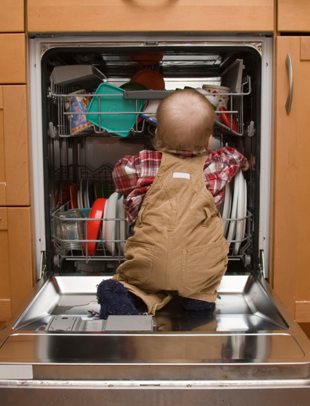 Child climbing in dishwasher Child climbing in dishwasher