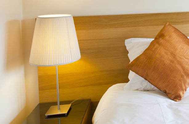 Lamp on a bedside table Lamp on a bedside table