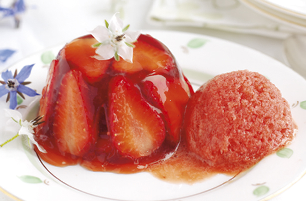 Strawberries in elderflower jelly with strawberry sorbet