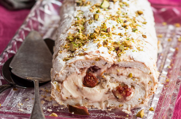 Meringue roulade with fig and pistachio filling