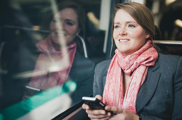Woman on the bus looking out of the window Woman on the bus looking out of the window