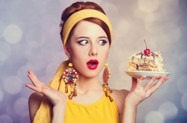 Woman eating dessert, annoying dieters