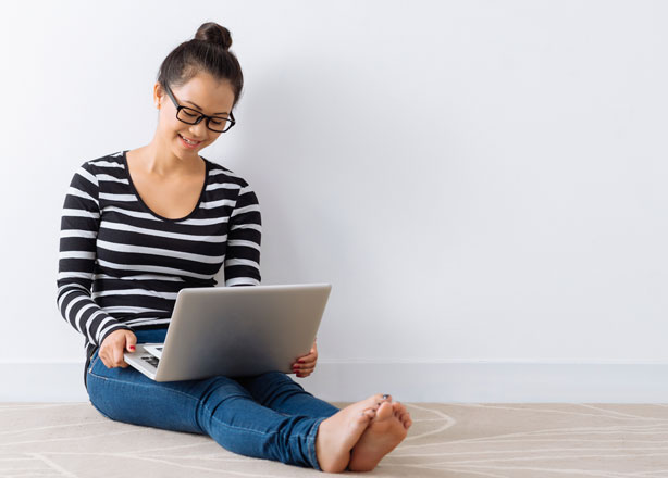 Young woman using a laptop computer