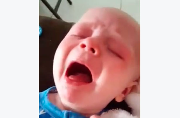Baby suffering with whooping cough