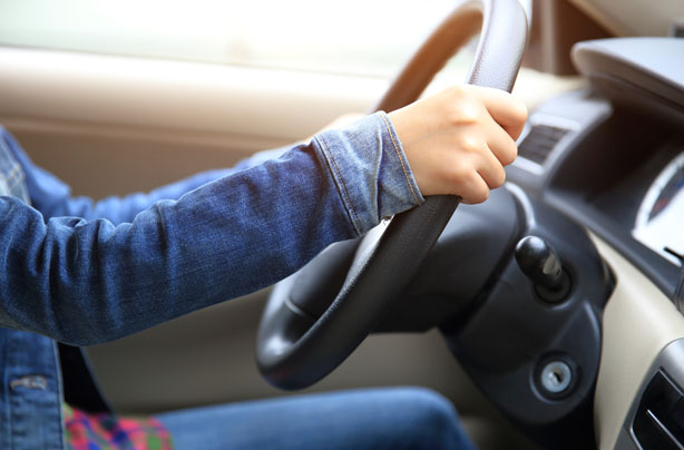 Woman driving, steering wheel Woman driving, steering wheel