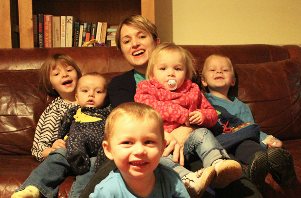 Gillian Harvey and family, bottle feeding