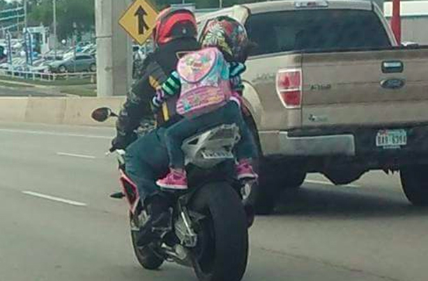 Seven year old on motor bike