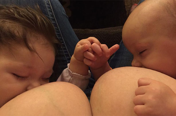 Tandem breastfeeding mum