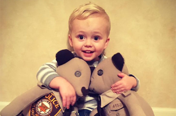 Boy given teddy bears made from dad's police uniform