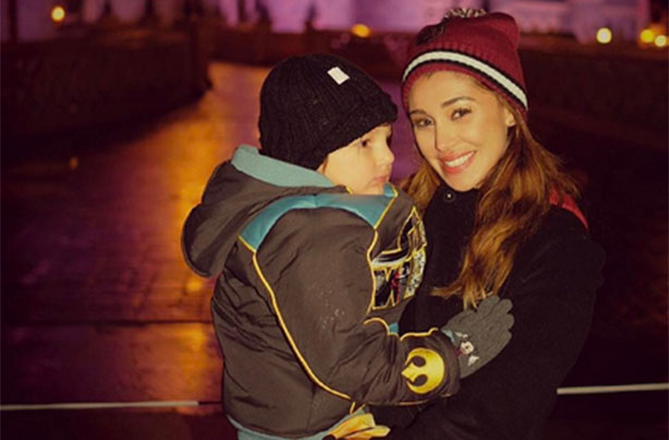 Mum sparks debate after kissing her son