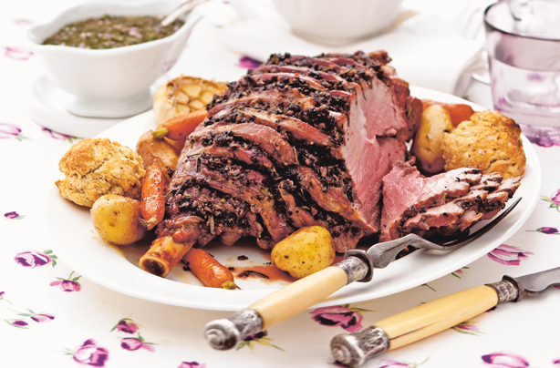 Herb-roasted leg of lamb with mustard dumplings