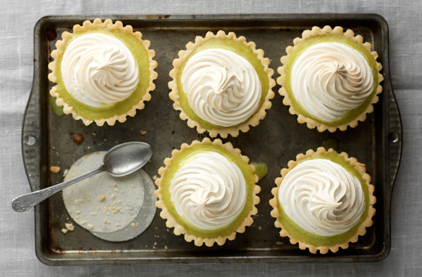 Lemon and lime meringue pies