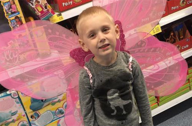 Little boy with fairy wings